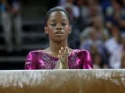 Douglas en uno de sus ejercicios que le valen ser la mejor gimnasta de Londres 2012. AFP  /