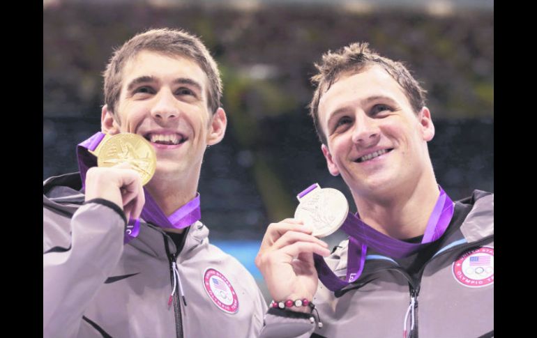 Rivales. Phelps y Lochte protagonizaron grandes duelos. XINHUA  /