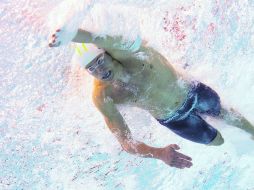 César Cielo nada a tope durante la final de 50 metros, sin embargo solamente le alcanzó para el tercer lugar. AFP  /