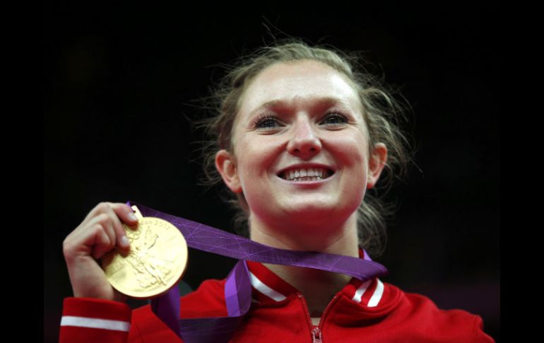 La gimnasta dorada mejora su séptimo puesto en Beijing. REUTERS  /