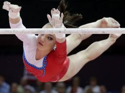 Mustafina durante su rutina, la mejor calificada por los jueces. AP  /