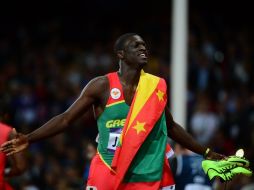 Kirani James celebra después de ganar en la competencia. AFP  /