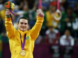 El brasileño Arthur Zanetti es el primer latinoamericano en ganar oro en gimnasia. AFP  /