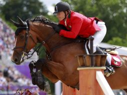 Michán, quien monta a Rosalía La Silla, recibió nueve castigos en la tercera tanda celebrada en el Greenwich Park . EFE  /