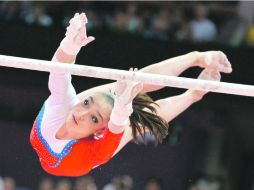 Atenta. Aliya Mustafina, durante su ejecución en la final. AP  /