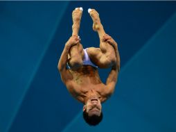 Yahel ejecuta un clavado en la final de tramplín de tres metros. AFP  /