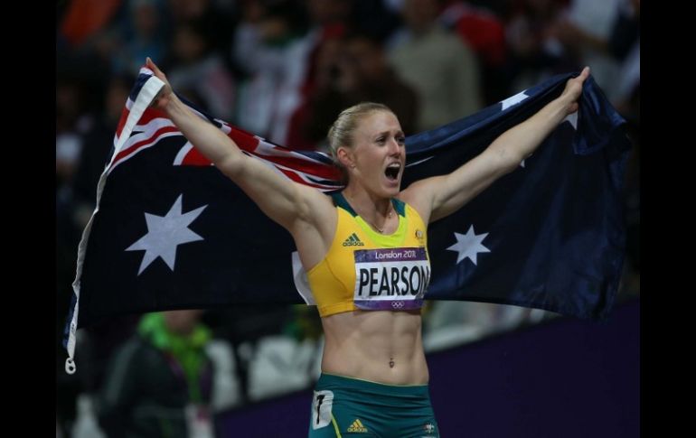 La atleta celebra su triunfo al final de la competencia. XINHUA  /