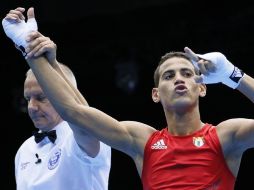 Ramírez tuvo un gran segundo asalto en una pelea muy disputada y terminó dando la gran sorpresa. AFP  /