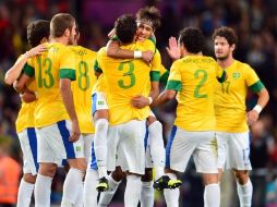 Los jugadores brasileños celebran la victoria ante Corea del Sur. XINHUA  /