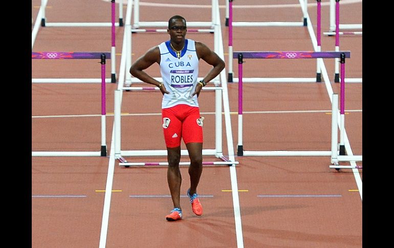 La grandísima decepción del día fue la pérdida de una de las grandes opciones de oro, con la lesión del cubano Dayron Robles. AFP  /