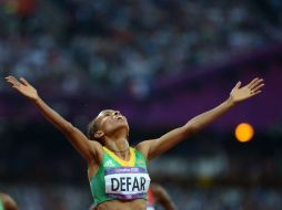 Meseret Defar, al momento de llevarse el primer lugar en los cinco kilómetros. AFP  /