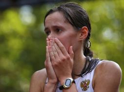 La marchista rusa celebra incrédula su oro olímpico. REUTERS  /