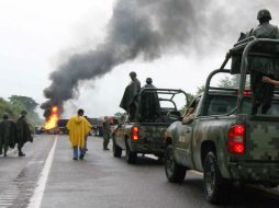 En la zona hay retenes, Ejército y alerta roja para circular por la zona poniente del estado de Michoacán. EFE  /