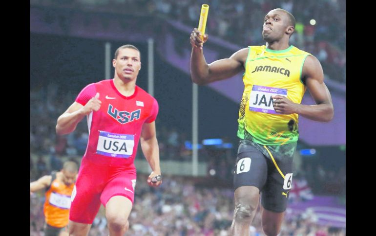 Definido. Usain Bolt cruza la meta, seguido por el estadounidense Ryan Bailey. REUTERS  /