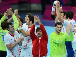 Los integrantes de la selección croata festejan el bronce. AFP  /