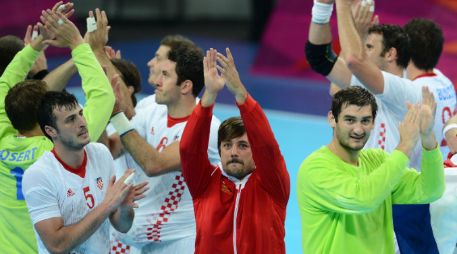 Los integrantes de la selección croata festejan el bronce. AFP  /