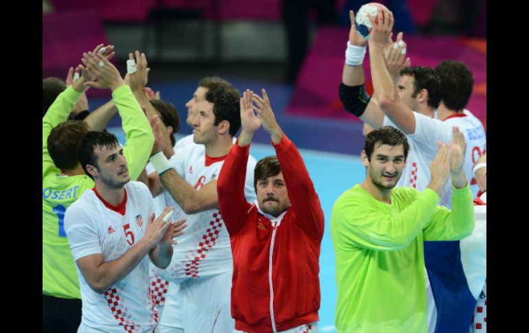 Los integrantes de la selección croata festejan el bronce. AFP  /