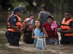 ''Ernesto'' dejó severas inundaciones y deslaves a su paso por las costas mexicanas. ARCHIVO  /