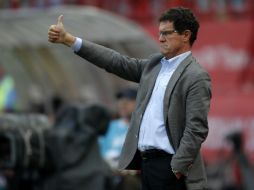 El entrenador de Rusia, Fabio Capello, observó un encuentro apretado entre las dos selecciones. AP  /