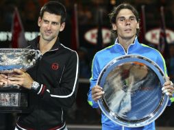 Djokovic (i), defensor del título en Nueva York, cree que si Rafael Nadal estuviera en condiciones acudiría al torneo. ARCHIVO  /