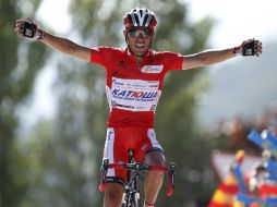 El ciclista español celebra su victoria conseguida con cinco segundos de ventaja y 12 de bonificación. AFP  /