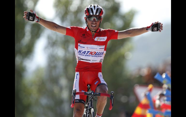 El ciclista español celebra su victoria conseguida con cinco segundos de ventaja y 12 de bonificación. AFP  /