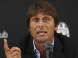 El técnico Antonio Conte, de la Juventus, arranca la temporada envuleto en un escandalo judicial. AP  /