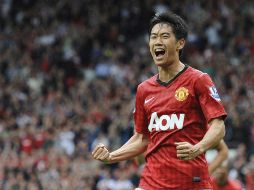 El jugador del ManU, Shinji Kagawa, celebra su gol marcado en el duelo ante el Fulham. EFE  /