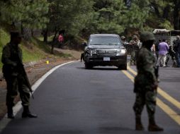 La camioneta en la que viajaban fue blanco de ráfagas de armas de fuego en la carretera México-Cuernavaca. ARCHIVO  /