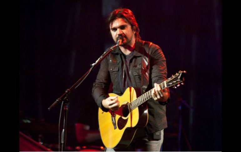 El cantautor Juanes durante su concierto en la ciudad de Mérida, para promocionar su disco umplugged por México. NOTIMEX  /