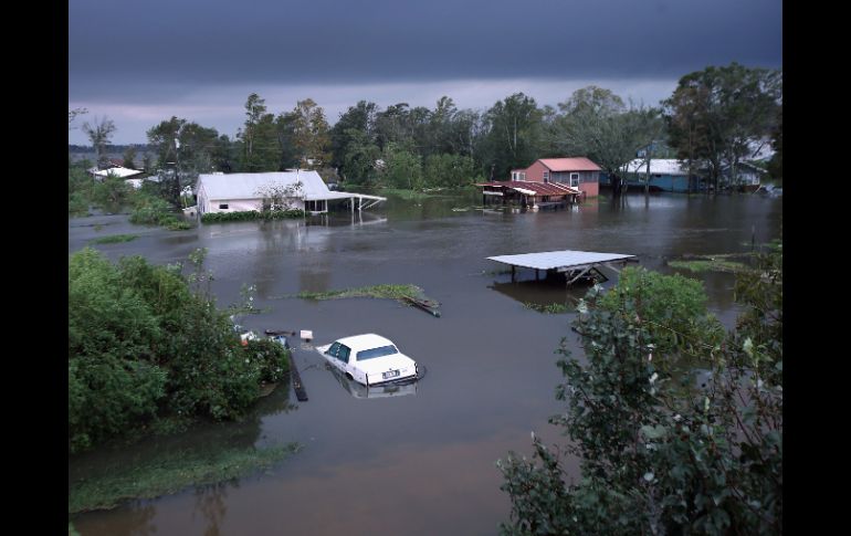 Louisiana se vio muy afectada tras el paso de ''Isaac''; se espera que la visita de Romney motive las donaciones a la Cruz Roja. AFP  /