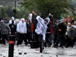 El asunto que detonó el disturbio fue un desfile republicano que los protestantes trataron de impedir con violencia. ESPECIAL  /