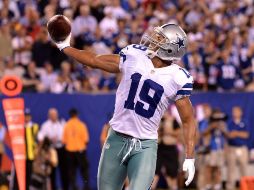 Miles Austin celebra la tercera anotación de los Vaqueros en el partido. EFE  /