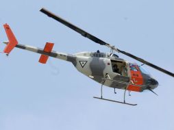 Un helicóptero de la Fuerza Aérea Mexicana (FAM) vigiló las acciones llevadas por tierra.  /