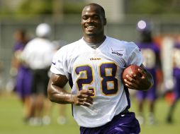 Adrian Peterson quiere regresar a los emparrillados. AP  /