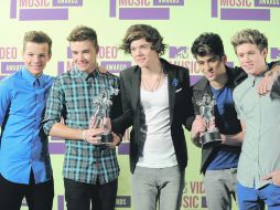 Los triunfadores. One Direction obtuvo tres preseas; competía en cinco categorías. AP  /