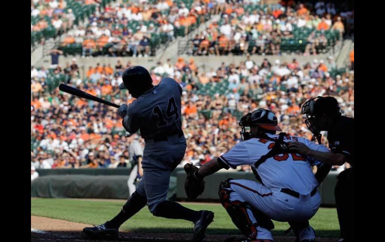 Curtis Granderson (14) fue la bujía en la victoria de los Yankees. AFP  /