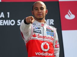 Tras la victoria de Hamilton el día de ayer en Monza, la escudería aseguró que haría todo para que el piloto se quede. ARCHIVO  /