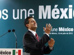 Enrique Peña Nieto exhortó a los legisladores del PRI a privilegiar el trabajo en unidad. ARCHIVO  /