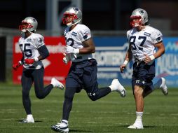 Brandon Lloyd, Kellen Winslow y  Rob Gronkowski en la práctica de los Patriotas. AP  /