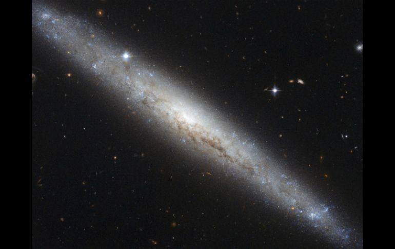 La galaxia NGC4183, fotografiada por el telescopio Hubble. EFE  /