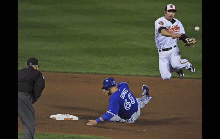 Acción del partido entre los Azulejos y los Orieles que terminó ganando el equipo de Toronto. REUTERS  /