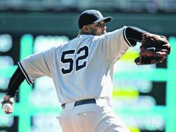 Intratable. CC Sabathia realiza un lanzamiento, durante el partido en el Target Field de Minneapolis. AFP  /