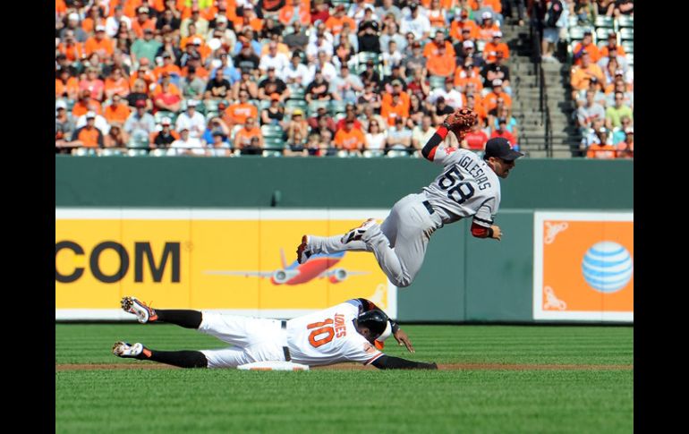 Acción del partido entres Boston y Baltimore de este domingo. AP  /