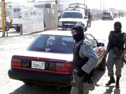 Elemento de la Policía acudieron al lugar para realizar las investigaciones correspondientes. ARCHIVO  /