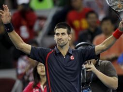 Djokovic venció en menos de una hora a Carlos Berlocq por 6-1, 6-3. EFE  /