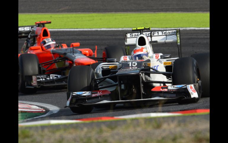 Sergio Pérez, quien correrá el próximo año con McLaren durante la segunda sesión de entrenamientos libre en Suzuka. AFP  /