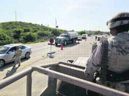 Bien vigilados. MIlitares colocaron retenes para intentar dar con sospechosos de la muerte de José Eduardo Moreira. EL UNIVERSAL  /