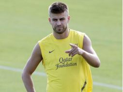 Piqué se lesionó en el tobillo el pasado 19 de septiembre, durante un partido ante el Spartak de Moscú. ARCHIVO  /