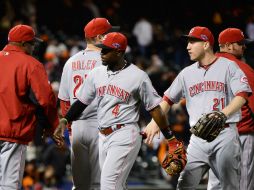 Los Rojos tomaron control de su tope de primera ronda de playoffs. AFP  /